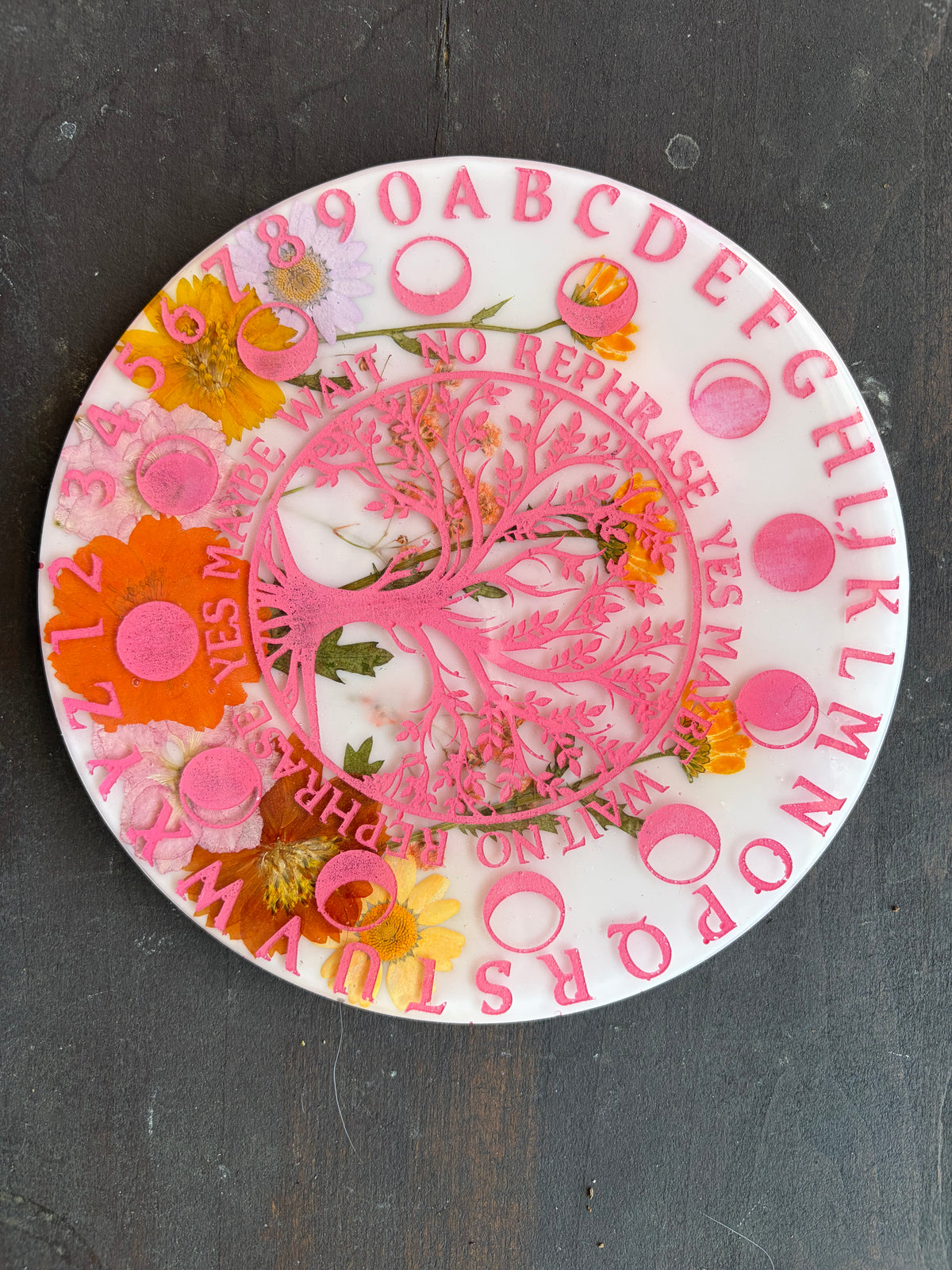 White and Pink Floral Pendulum Board